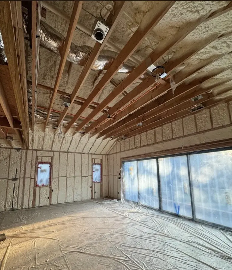 Interior walls and ceiling insulated with spray foam during new construction in Phoenixville